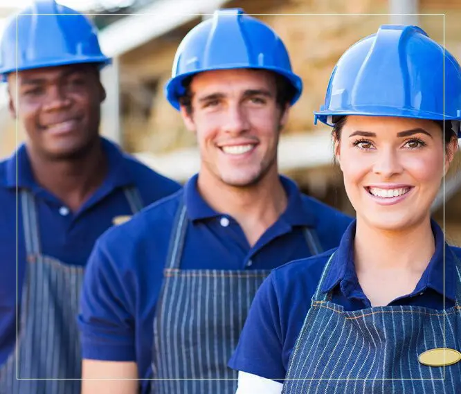 A group of people wearing blue hard hats.